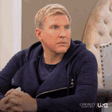 todd chrisley stare look not blinking red long sleeves