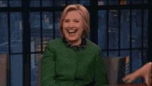 hillary clinton laughing happy