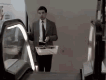 How Do I Escalator? - Mr. Bean GIF - Mr Bean Rowan Atkinson Escalator GIFs