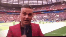 Robbie Williams World Cup GIF - Robbie Williams World Cup Flipping The Bird GIFs