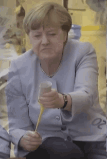 Angela Merkel Celebrate GIF - Angela Merkel Celebrate Popper GIFs