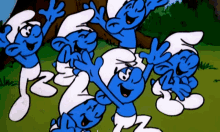 The Smurfs Cheering Fans GIF - The Smurfs Cheering Fans Crowd Goes Wild GIFs