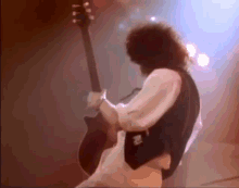 Queen Brian May GIF - Queen Brian May Stare GIFs