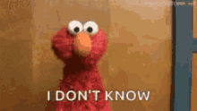 Elmo Dont Know GIF - Elmo Dont Know Shrug GIFs