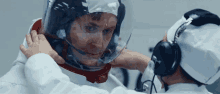 fixing fitting suit astronaut sad sad eyes