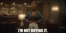 Pam And Tommy Pamela Anderson GIF - Pam And Tommy Pamela Anderson Im Not Buying It GIFs