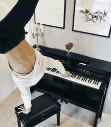 Playing Piano This Is Happening GIF - Playing Piano This Is Happening Handstand While Playing Piano GIFs