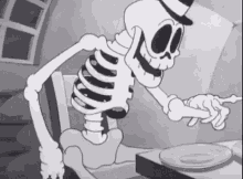 Skeleton Eats GIF - Skeleton Eats Bones GIFs
