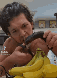 Guy Eating Rotten Banana Eats Rott Banana GIF - Guy Eating Rotten Banana Eats Rott Banana Black Banana GIFs