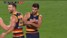 adelaide crows yeah pumped chest bump