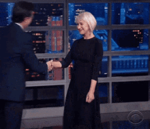 Helen Mirren Stephen Colbert GIF - Helen Mirren Stephen Colbert Kiss GIFs