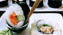 Sushi Dipped In Soy Sauce GIF - Japanesefood Sushi Sushiroll GIFs