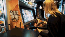 Arcade Game Guitar Hero GIF - Arcade Game Guitar Hero Focused GIFs