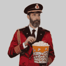 Captain Obvious Popcorn GIF - Captain Obvious Popcorn Nodding GIFs