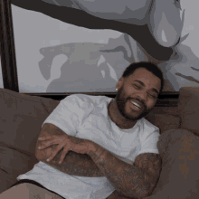 Laughing Kevin Gates GIF - Laughing Kevin Gates 90s Music Video Reactions GIFs