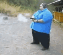 Fat Guy GIF - Fat Guy Gun Shots GIFs