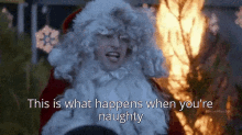 You Deserved This GIF - Andy Samberg Santa Claus Fire GIFs