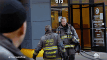 hugging randall mcholland christopher herrmann chicago fire come here