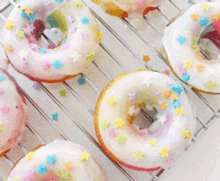 Rainbow Doughnuts Donuts GIF - Rainbow Doughnuts Doughnuts Donuts GIFs