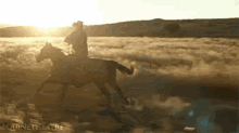 Riding Into The Sunset GIF - Cowboy Riding Horseback Riding GIFs