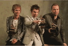 мэттью беллами Muse крис уолстенхолм ховард доминик GIF - Muse Rock Matt Bellamy GIFs