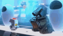 Cleaning Walle GIF - Cleaning Walle Mo GIFs