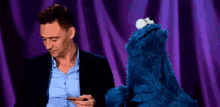 Tom Hiddleston Cookie Monster GIF - Tom Hiddleston Cookie Monster Cookie For You GIFs