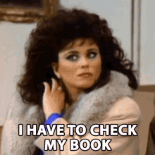 I Have To Check My Book Susanne Sugarbaker GIF - I Have To Check My Book Susanne Sugarbaker Delta Burke GIFs