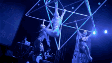 Trapeze Hanging On GIF - Trapeze Hanging On Acrobats GIFs