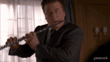 Playing Flute Jack Donaghy GIF - Playing Flute Jack Donaghy 30rock GIFs