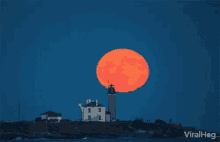 viralhog full moon time lapse lighthouse rise