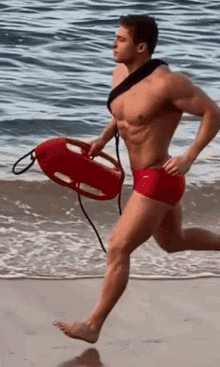 Lifeguard Muscular Guy GIF - Lifeguard Muscular Guy Jogging GIFs