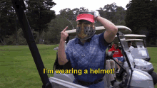 Wearing Helmet Pointing GIF - Wearing Helmet Pointing Look At Me GIFs
