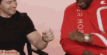 Fist Bump Mark Wahlberg GIF - Fist Bump Mark Wahlberg Winston Duke GIFs