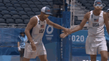 give me five phil dalhausser nick lucena usa mens beach volleyball team nbc olympics