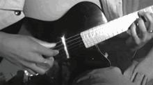 Strumming Guitar Moses Sumney GIF - Strumming Guitar Moses Sumney Keeps Me Alive Song GIFs