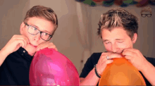 A Helium Balloon Popping In Marcus Butler'S Face GIF - Tyler Oakley Marcus GIFs