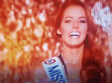 miss france rousse red smile