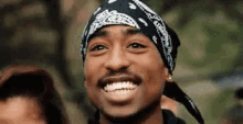Tupac GIF - Tupac Shakur Cigar Smile GIFs
