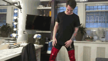 Stretching GIF - Elle Magazine Brendon Urie Stretching GIFs