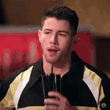 Sips Straw Nick Jonas GIF - Sips Straw Nick Jonas The Voice GIFs
