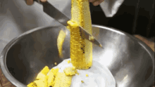 11. Then Use Two Bowls (A Smaller One Inside A Larger One) To Cut Corn Off The Cob. GIF - Corn Cob Hack GIFs