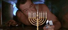 Light The Menorah Candle GIF - Light The Menorah Candle Die Hard GIFs