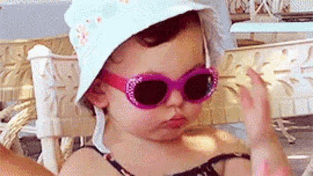 Baby Sunglasses GIF - Baby Sunglasses Stare - Descubre & Comparte GIFs