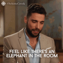 Feels Like Theres An Elephant In The Room Ted GIF - Feels Like Theres An Elephant In The Room Ted Ted Mullens GIFs