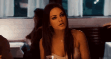 Trying To Seem Interested On A Date GIF - Milakunis Nodding Okay GIFs