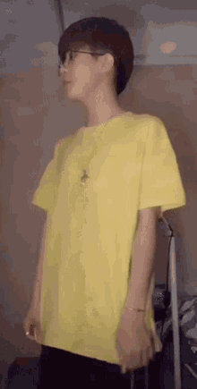 Yellow Shirt Fix Shirt GIF - Yellow Shirt Fix Shirt Guy GIFs