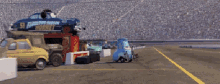 Cars Pit Stop GIF - Cars Pit Stop Guido GIFs