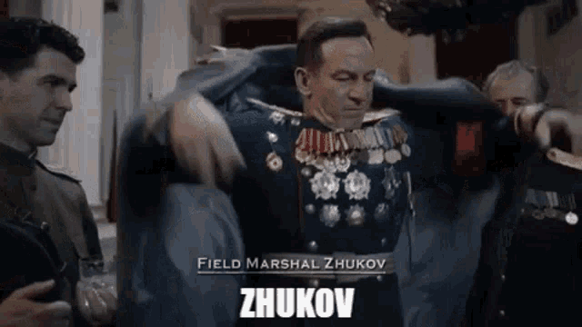 remove-coat-the-death-of-stalin.gif