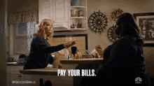 Pay Your Bills Retta GIF - Pay Your Bills Retta Christina Hendricks GIFs